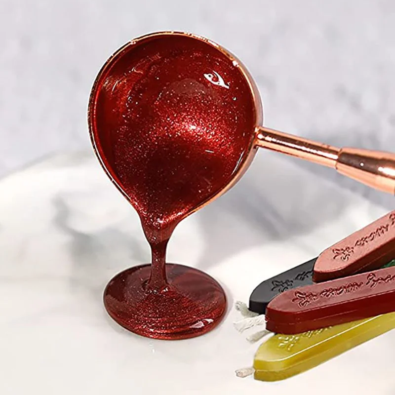 Spoon applying sealing wax