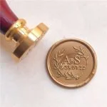 Sealing-wax-seal-with-initials-and-olive-branches Sealing wax personalized with initials and olive branches