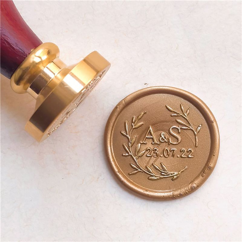 Sealing wax personalized with initials and olive branches