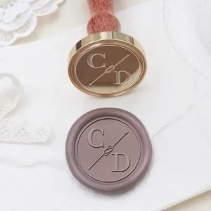 initials sealing wax and infinity symbol