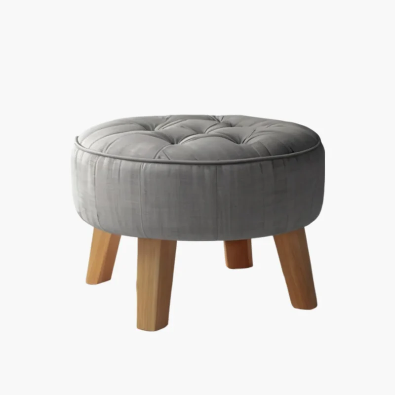 Round Gray Tufted Ottoman with Four Wooden Legs Low profile Seating Furniture Piece