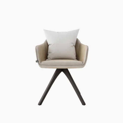 Beige Upholstered Armchair with a White Cushion and Dark Angled Four legged Base Against a White Background